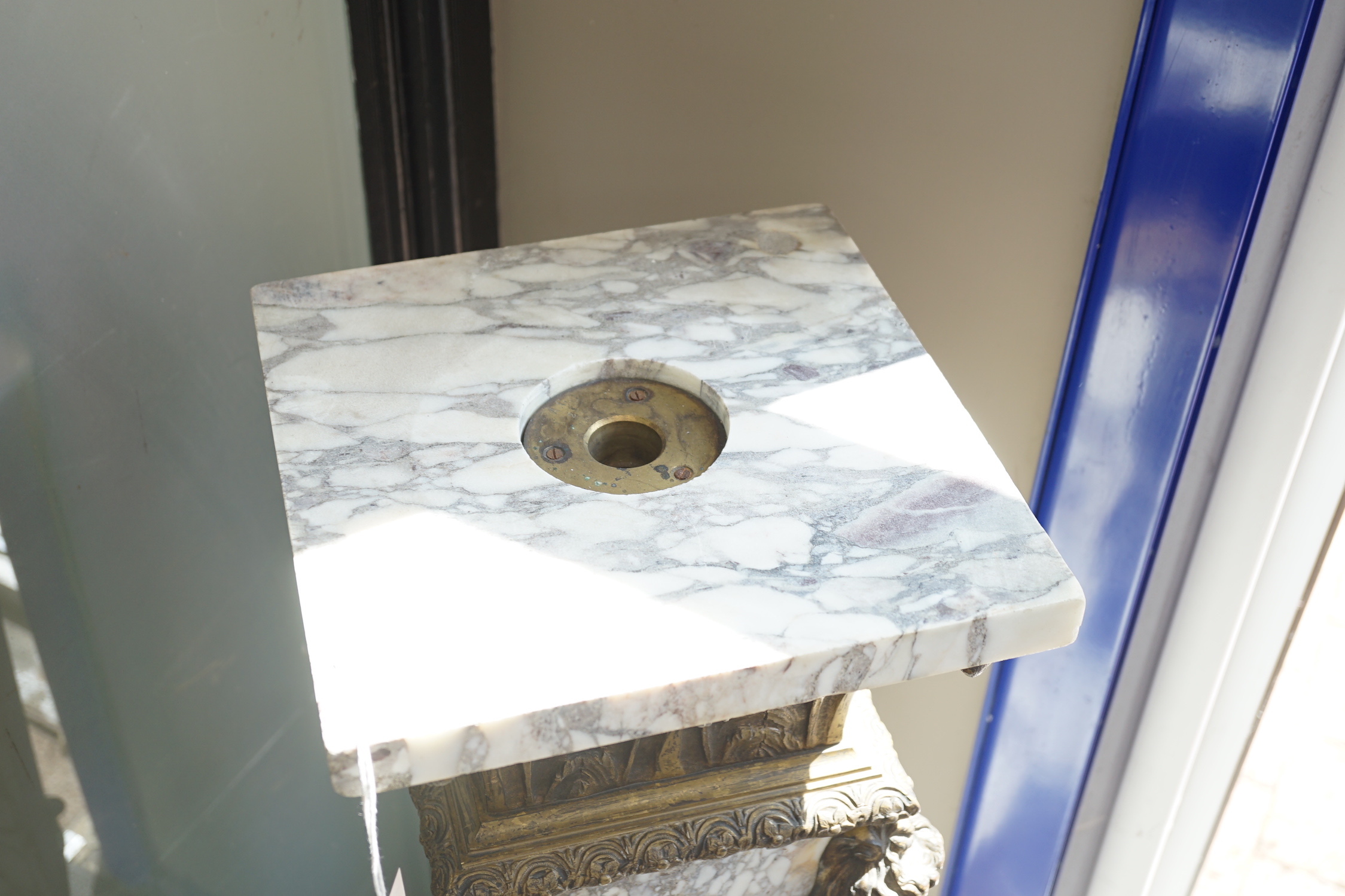 A gilt metal mounted reconstituted marble pedestal, height 113cm